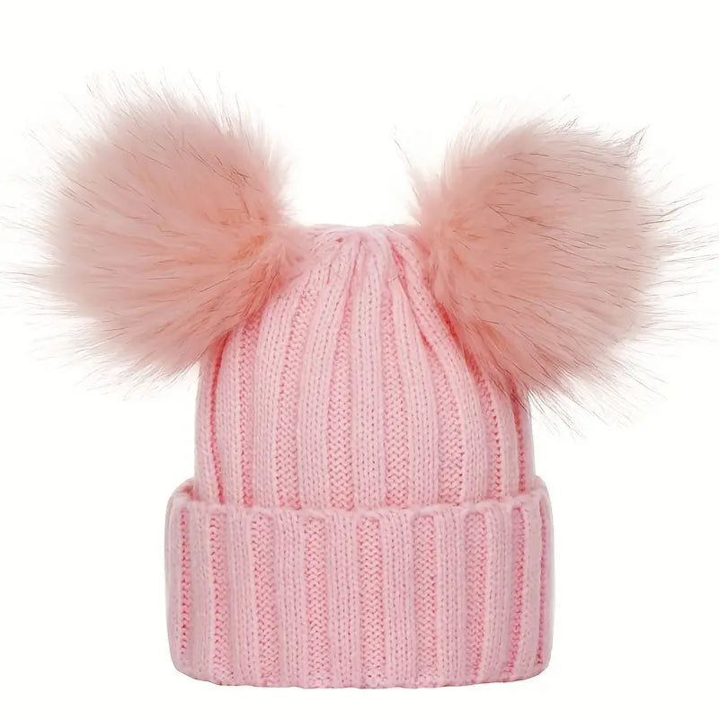 Ladies winter hat with pompoms