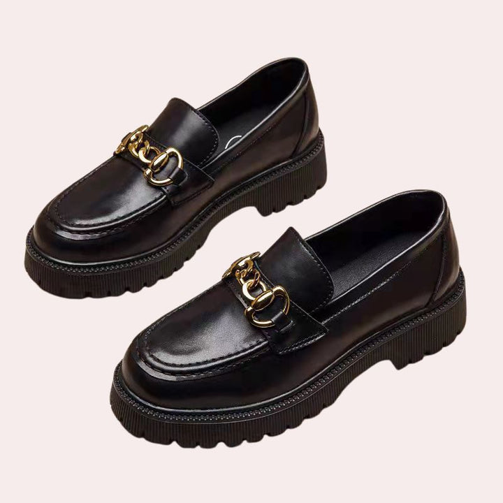 Women's imitation leather loafers with gold buckle