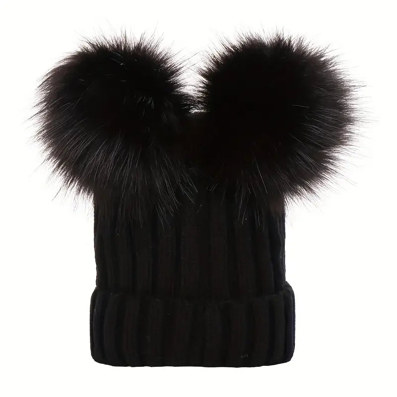 Ladies winter hat with pompoms