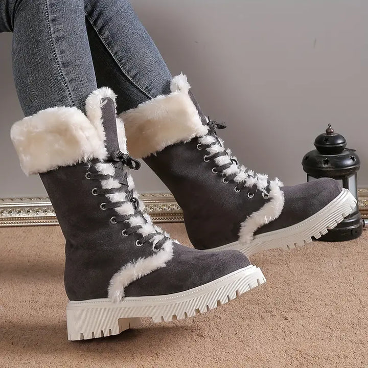 Stylish winter boots with faux fur for women