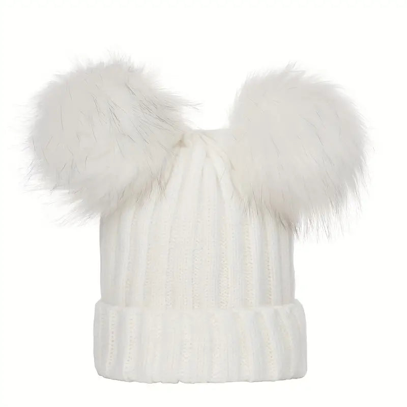 Ladies winter hat with pompoms