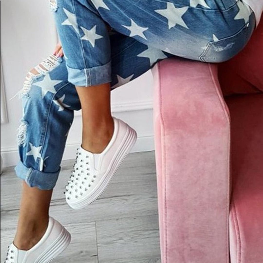 Jeans with rips and stars print ladies