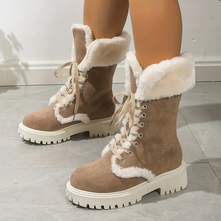 Stylish winter boots with faux fur for women