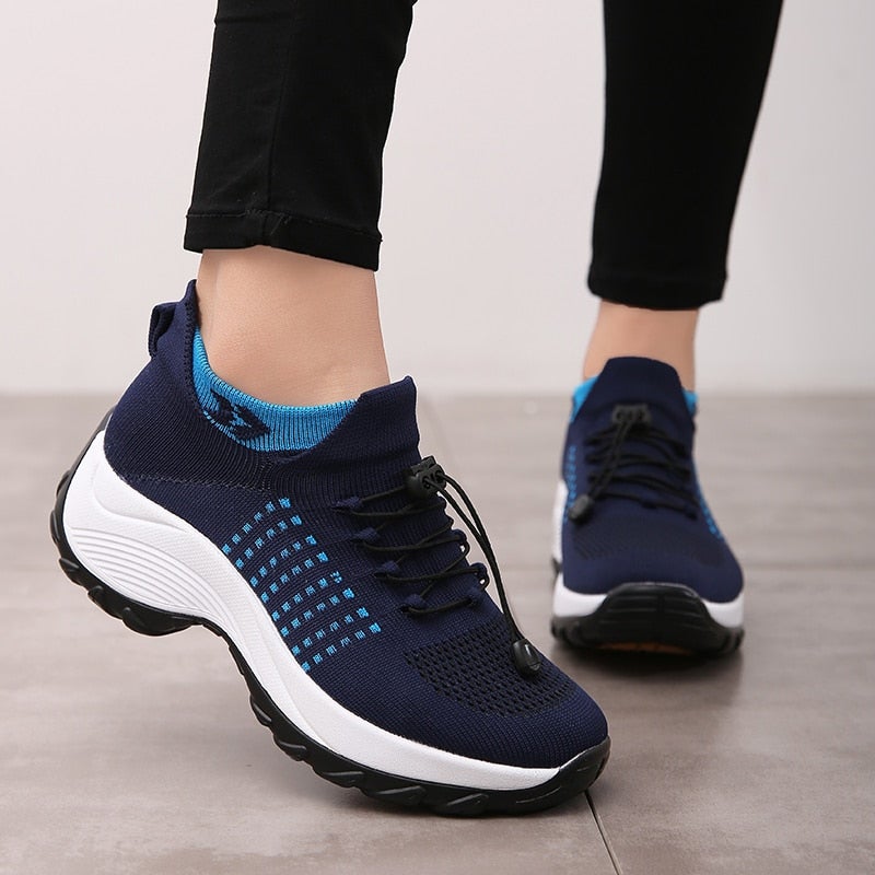 Women's trainer with sock for comfort, firmness and stability