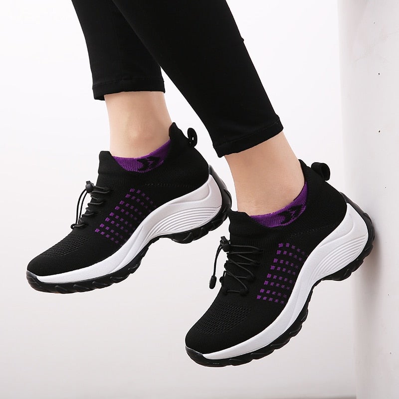 Women's trainer with sock for comfort, firmness and stability